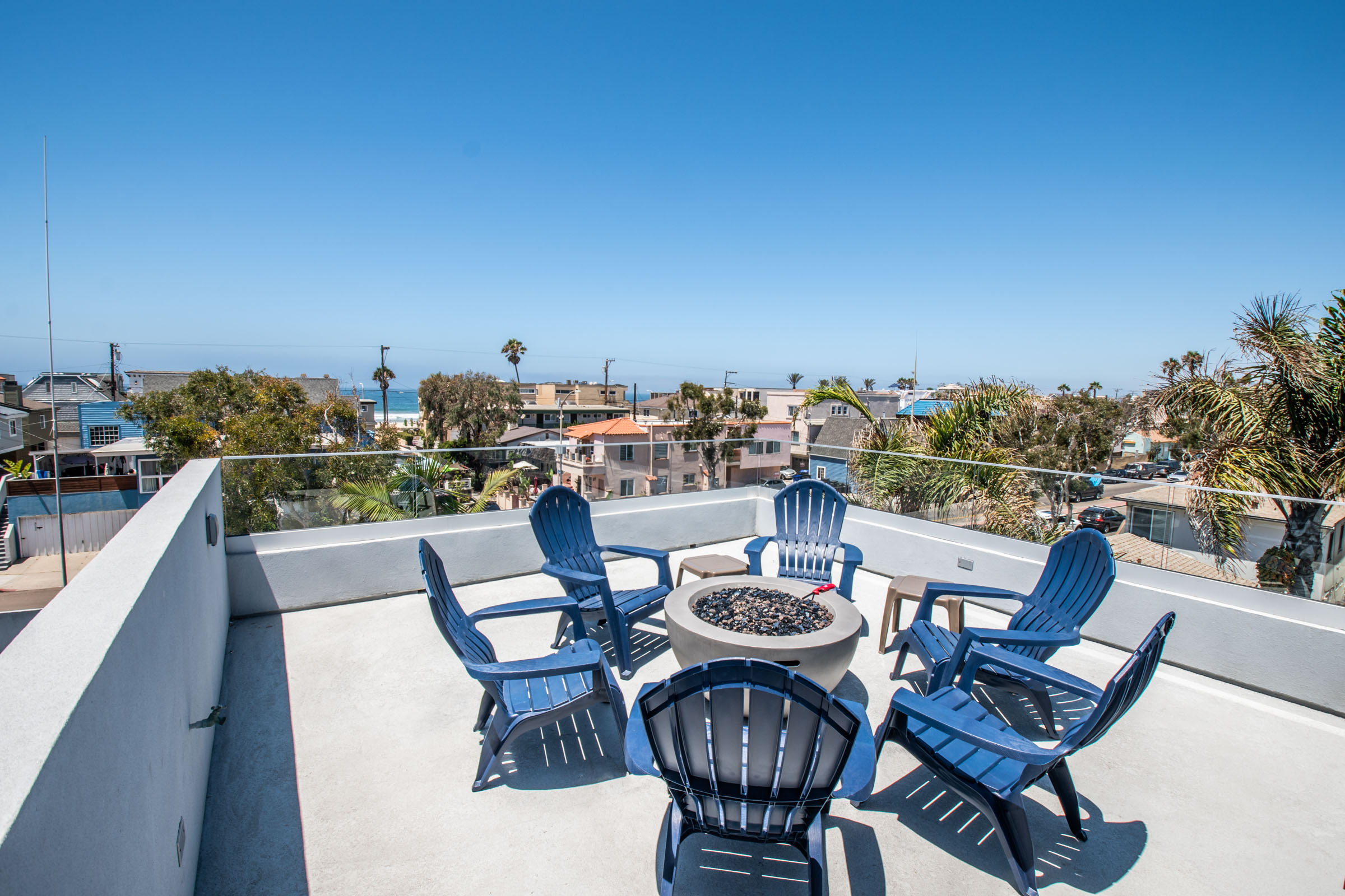 Rooftop deck with built-in seating and fire pit